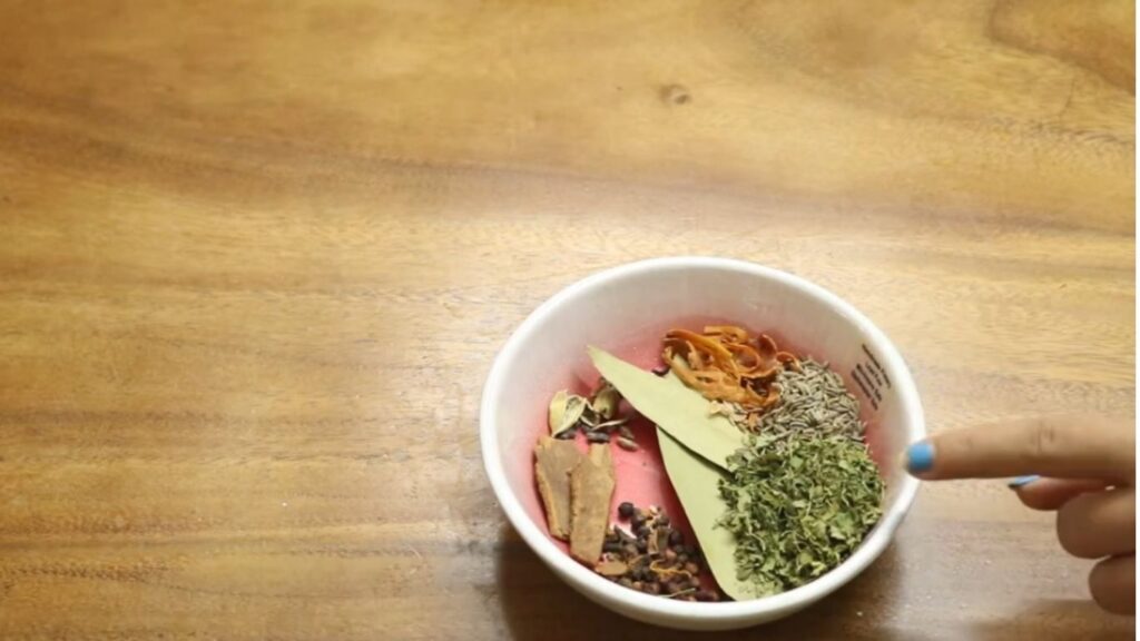 Golden onion, , garlic, ginger, and a colorful array of spices including turmeric, garam masala, and cumin seeds arranged neatly Flavorful Gluten-Free Prawn Biryani | Light and Healthy Seafood